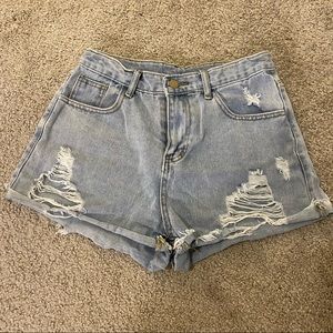 Distressed light denim shorts